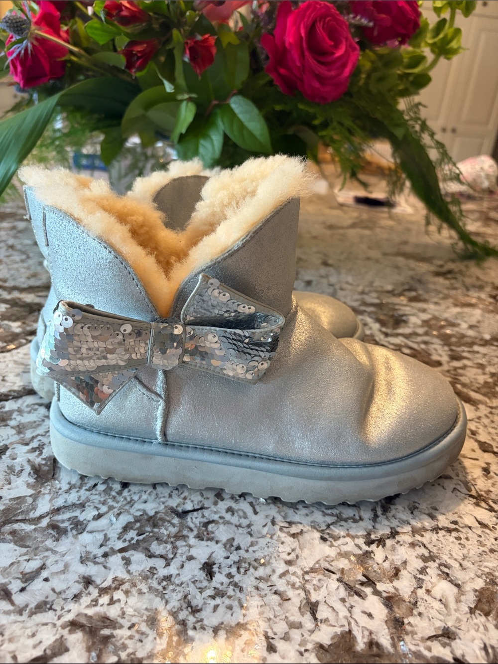 UGG Silver Sequin Bow Shearling Ankle Bootie size 7
